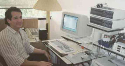 Dr. Robert Fels with his biofeedback instruments during 1989.